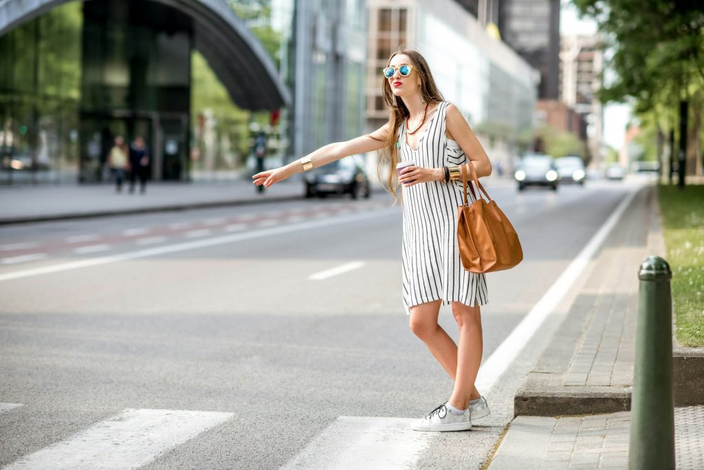 Woman cathcing a taxi.jpg
